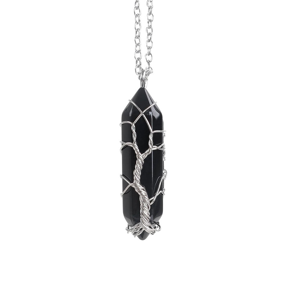 Black crystal pendant with silver wire wrapping on a white background