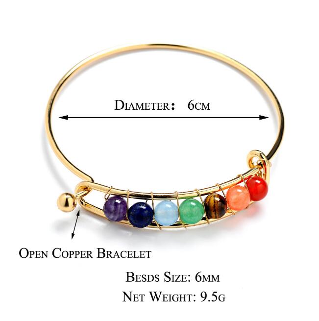 Open copper bracelet with colorful beads and measurements on a white background