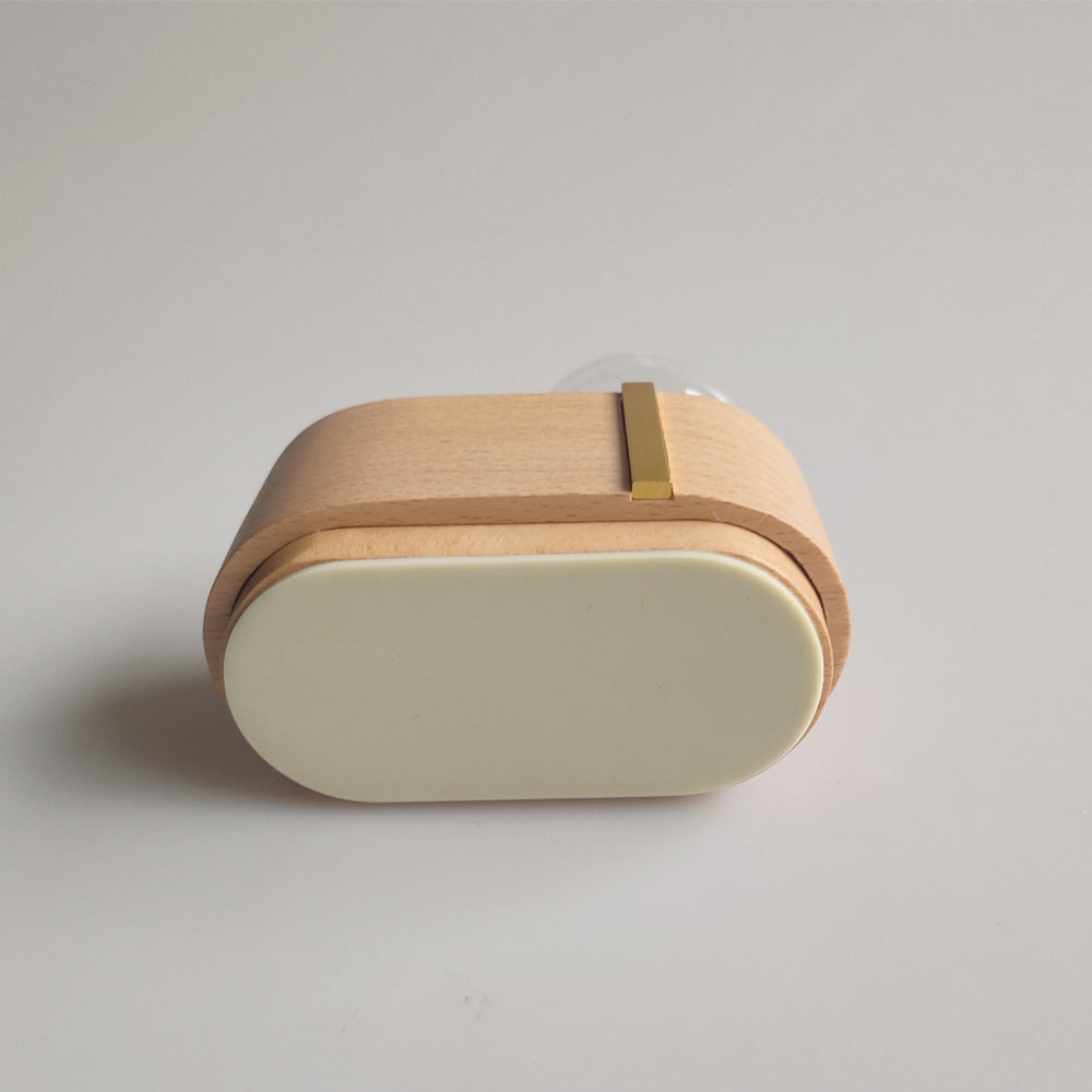 Rectangular wooden container with a beige lid on a light gray background