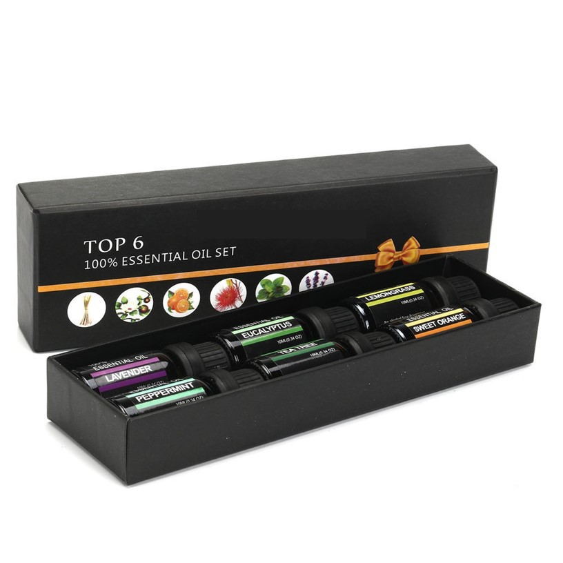 Top 6 essential oil set in a black box with visible labels on a white background
