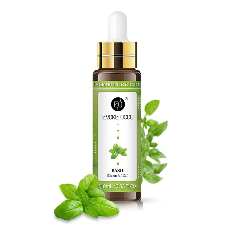 Bottle of Evoke Occu basil essential oil with dropper on a white background