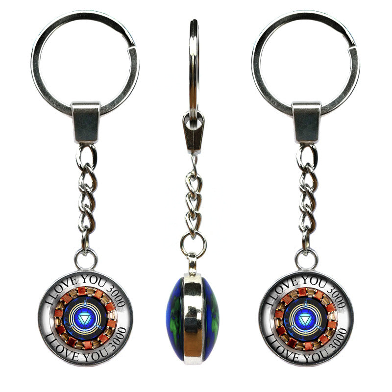 Three keychains with circular designs and 'I Love You 3000' text on a white background