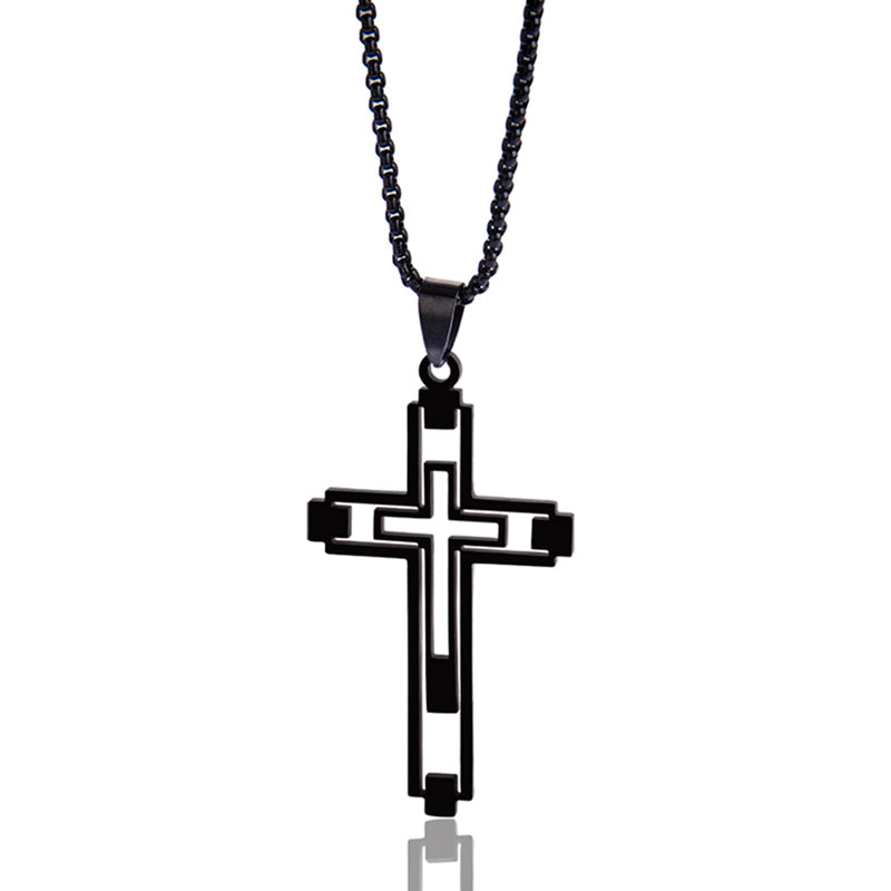 Black cross pendant necklace on a white background