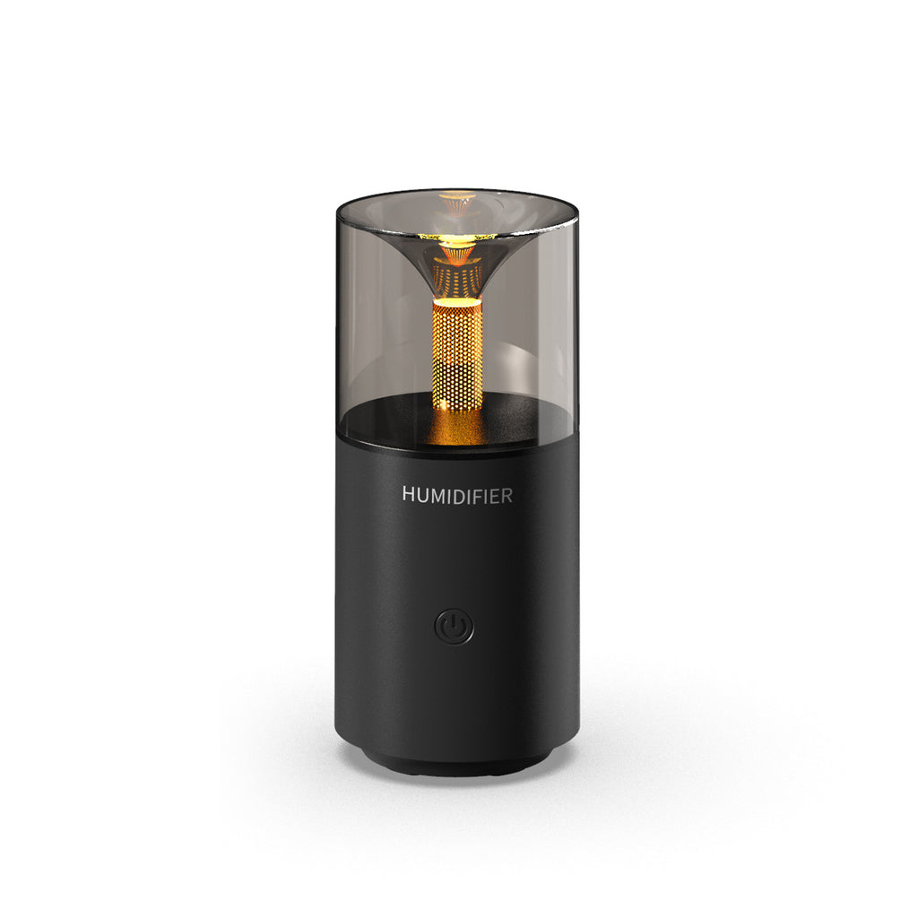 Black humidifier with gold interior on a white background