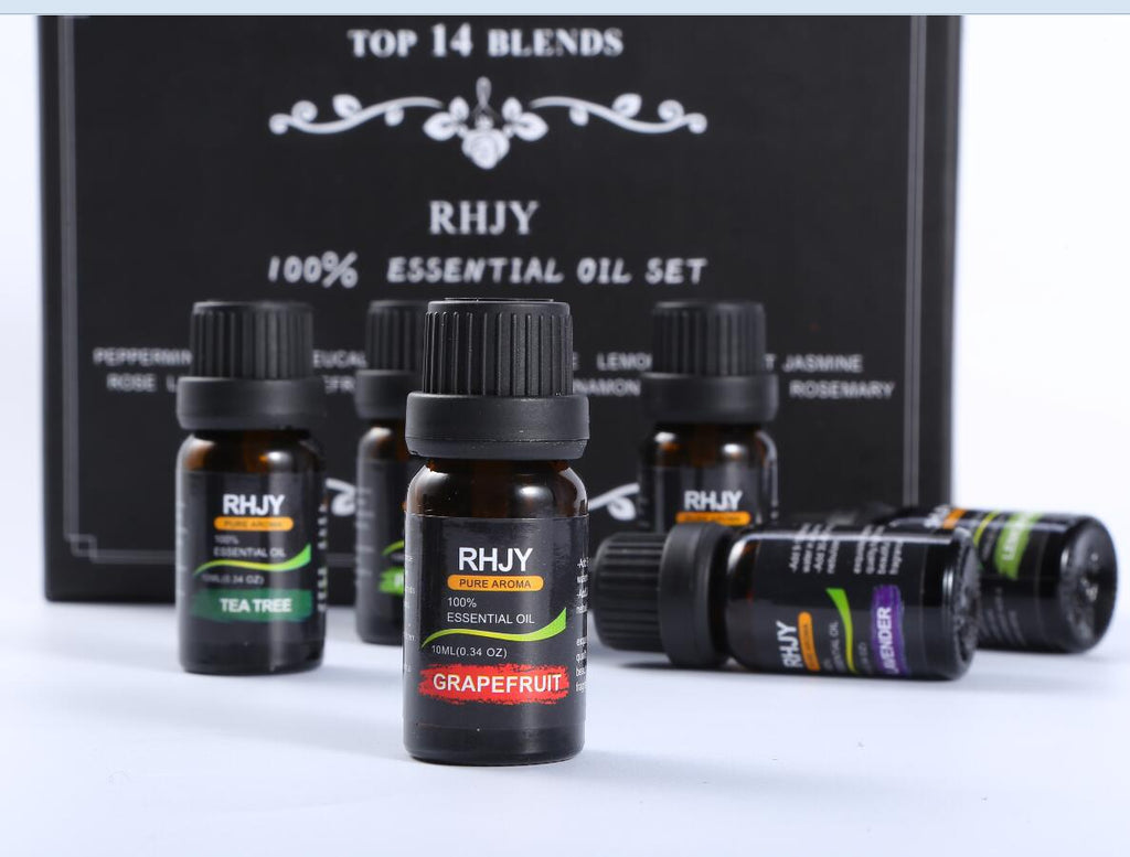 RHJY essential oil bottles with a black box labeled 'Top 14 Blends' in the background.