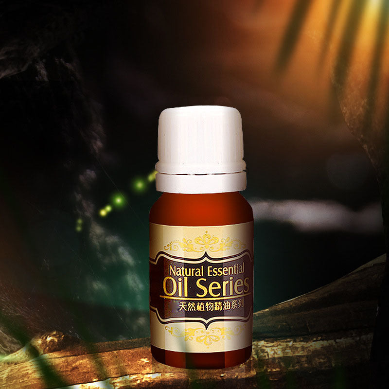 Bottle of Natural Essential Oil Series on a dark background with plant elements.