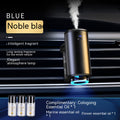 Car air freshener with blue light and steam, placed in a car's air vent.