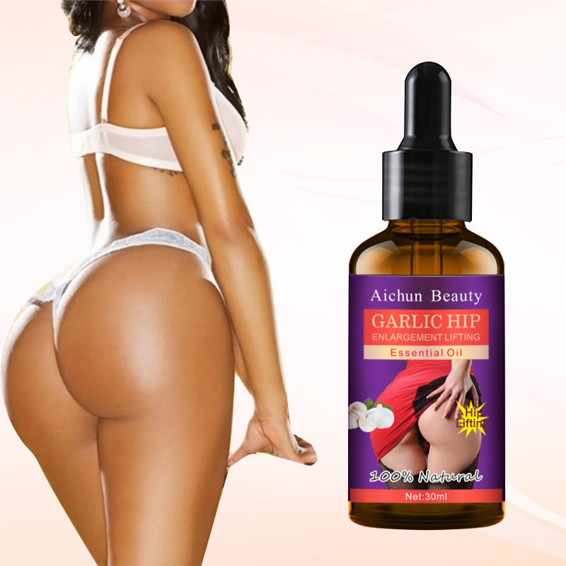 Bottle of Aichun Beauty Garlic Hip Essential Oil with a woman in a white bikini on a beige background