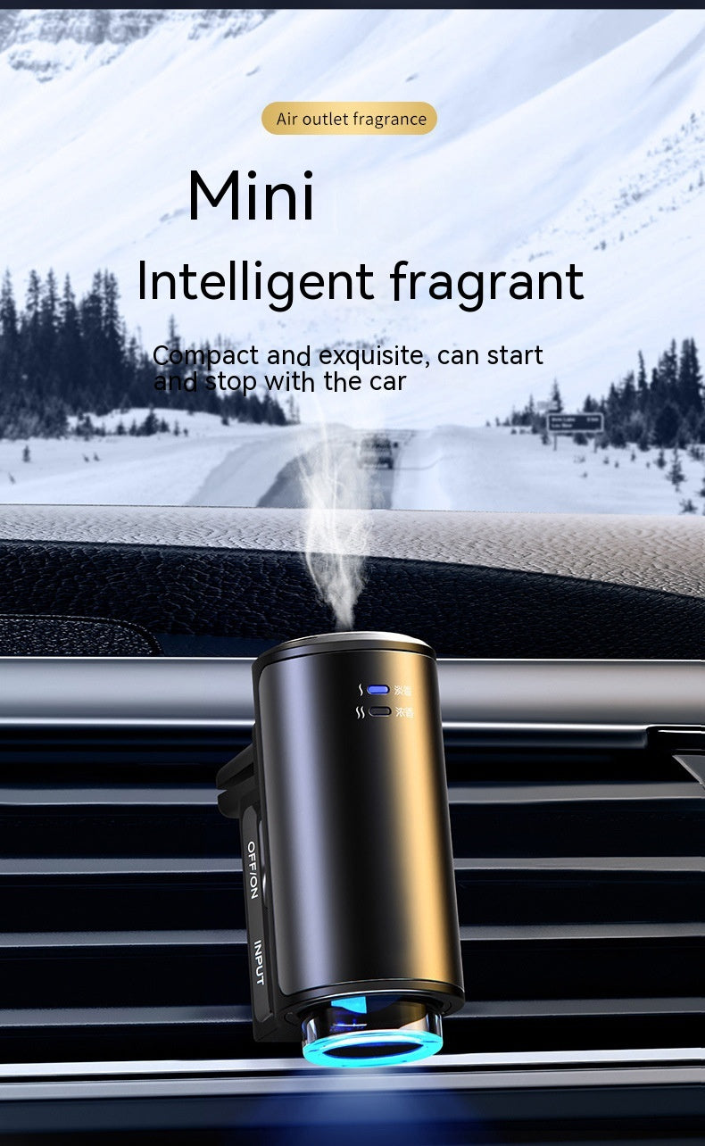 Car air freshener with mountain landscape in the background