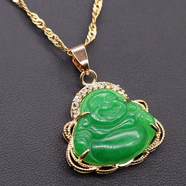 Green Buddha pendant with gold chain on a dark background