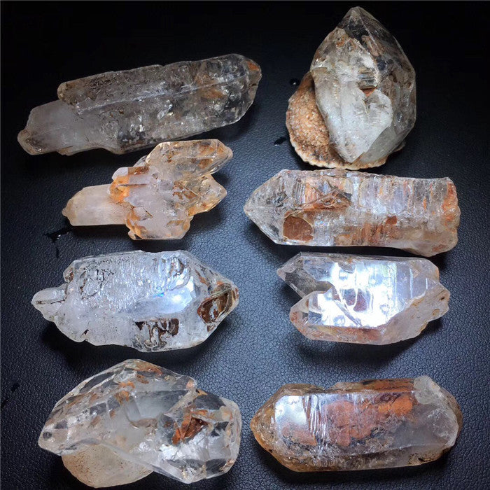 Collection of crystal rocks on a dark surface