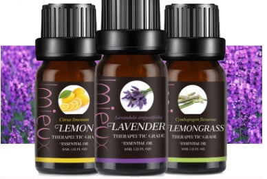 Three essential oil bottles labeled 'Lemon', 'Lavender', and 'Lemongrass' with purple and lavender background.