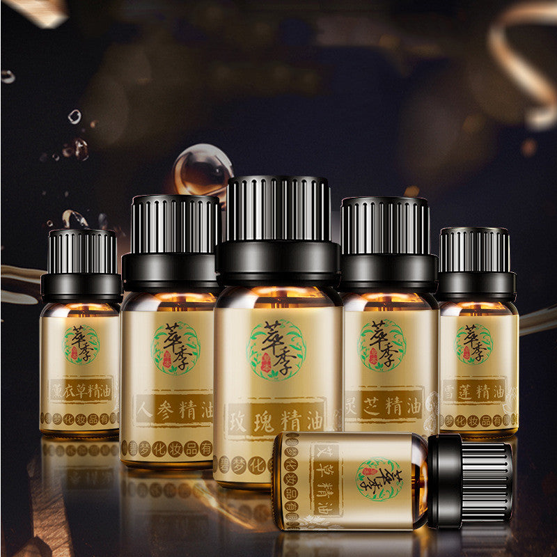 Set of small bottles with labels on a reflective surface