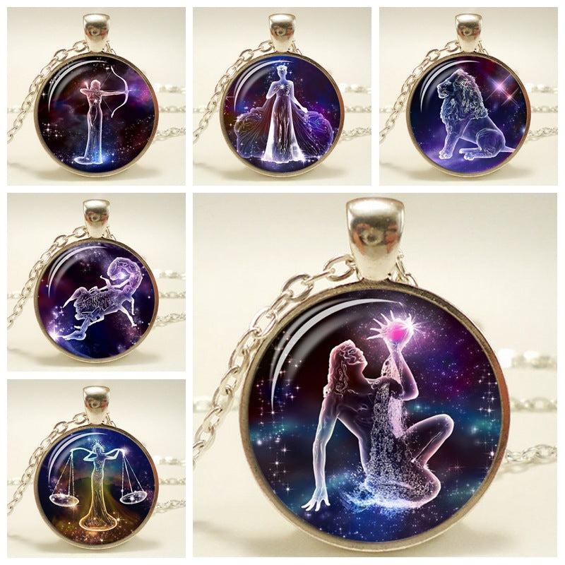 Collection of zodiac pendant necklaces on a white background