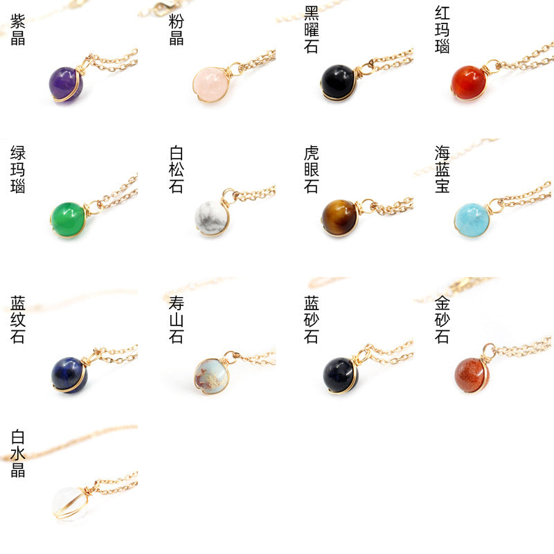 Collection of gold necklaces with various gemstones on a white background