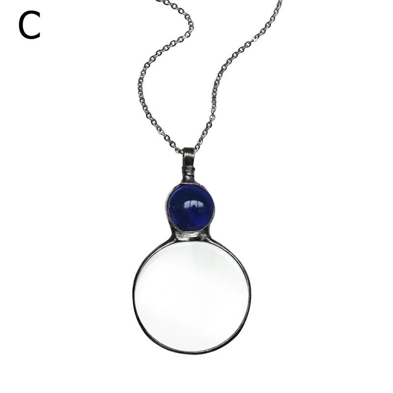 Necklace with a round pendant featuring a blue gemstone on a white background
