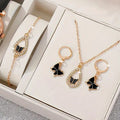 Jewelry set with butterfly charms in a box