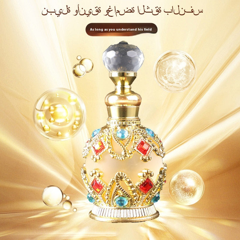 Decorative perfume bottle with gemstones on a gold background