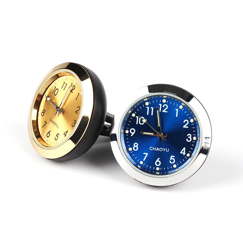 Two clocks, one gold and one blue, on a white background