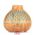 Wooden diffuser with blue lights on a white background