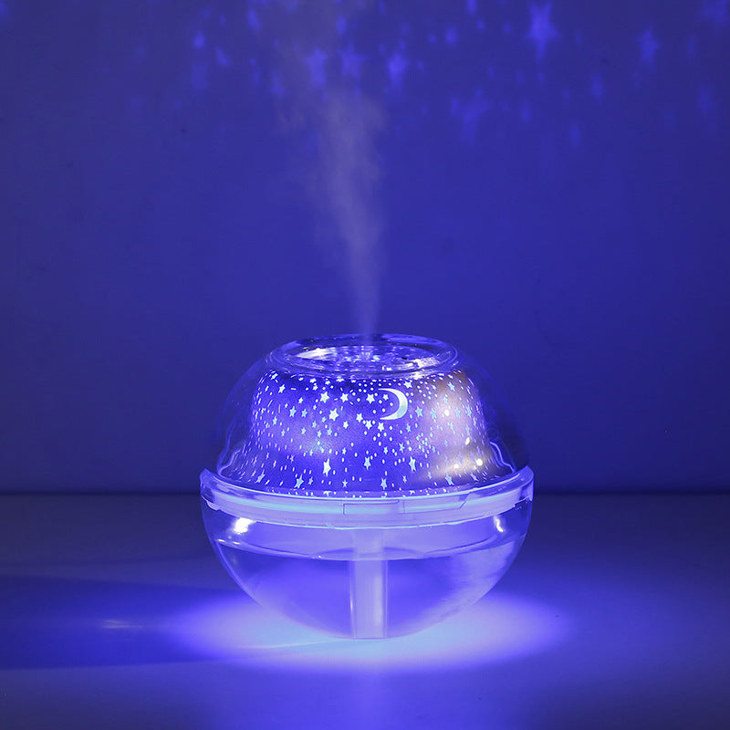 Clear night light with starry design on a dark blue background