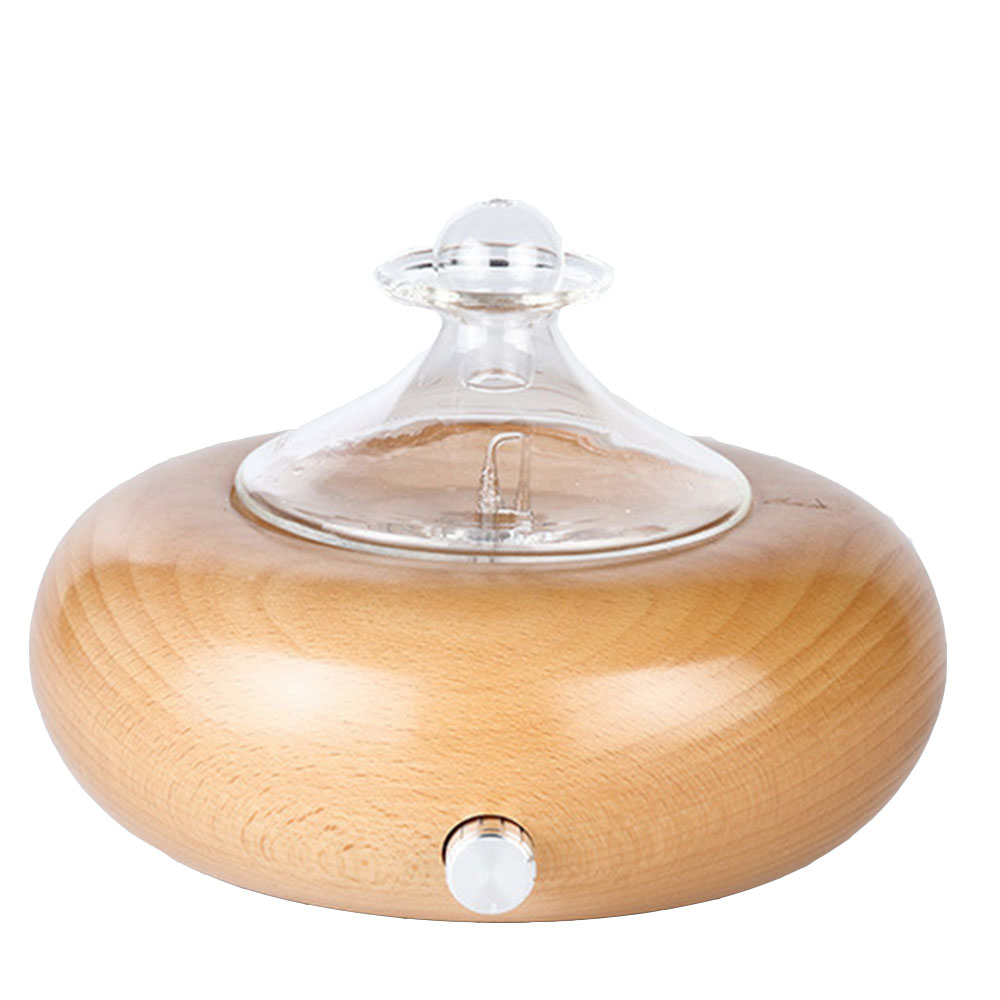 Wooden diffuser with clear glass top on a white background