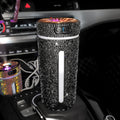 Decorative car air freshener with crystals on a car dashboard