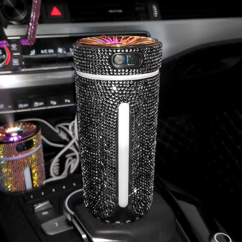 Decorative car air freshener with crystals on a car dashboard