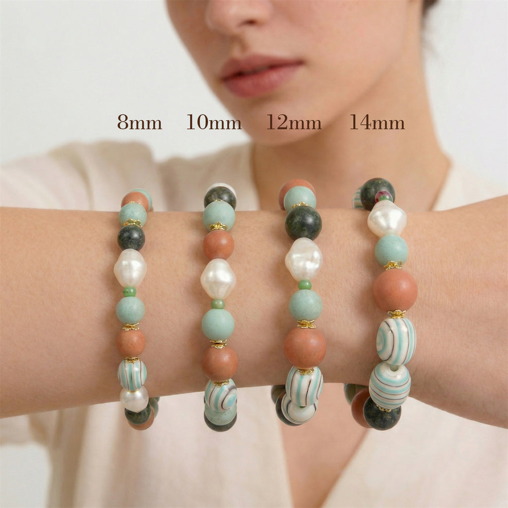 Beaded bracelets on a wrist with size labels