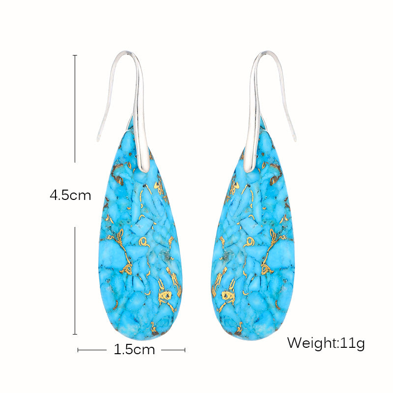 Pair of blue earrings with gold patterns, shown with measurements and weight on a white background.
