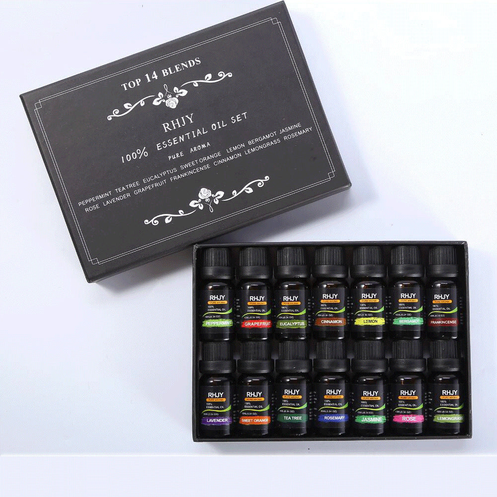 Set of essential oil bottles with a black box labeled 'Top 14 Blends' on a white background