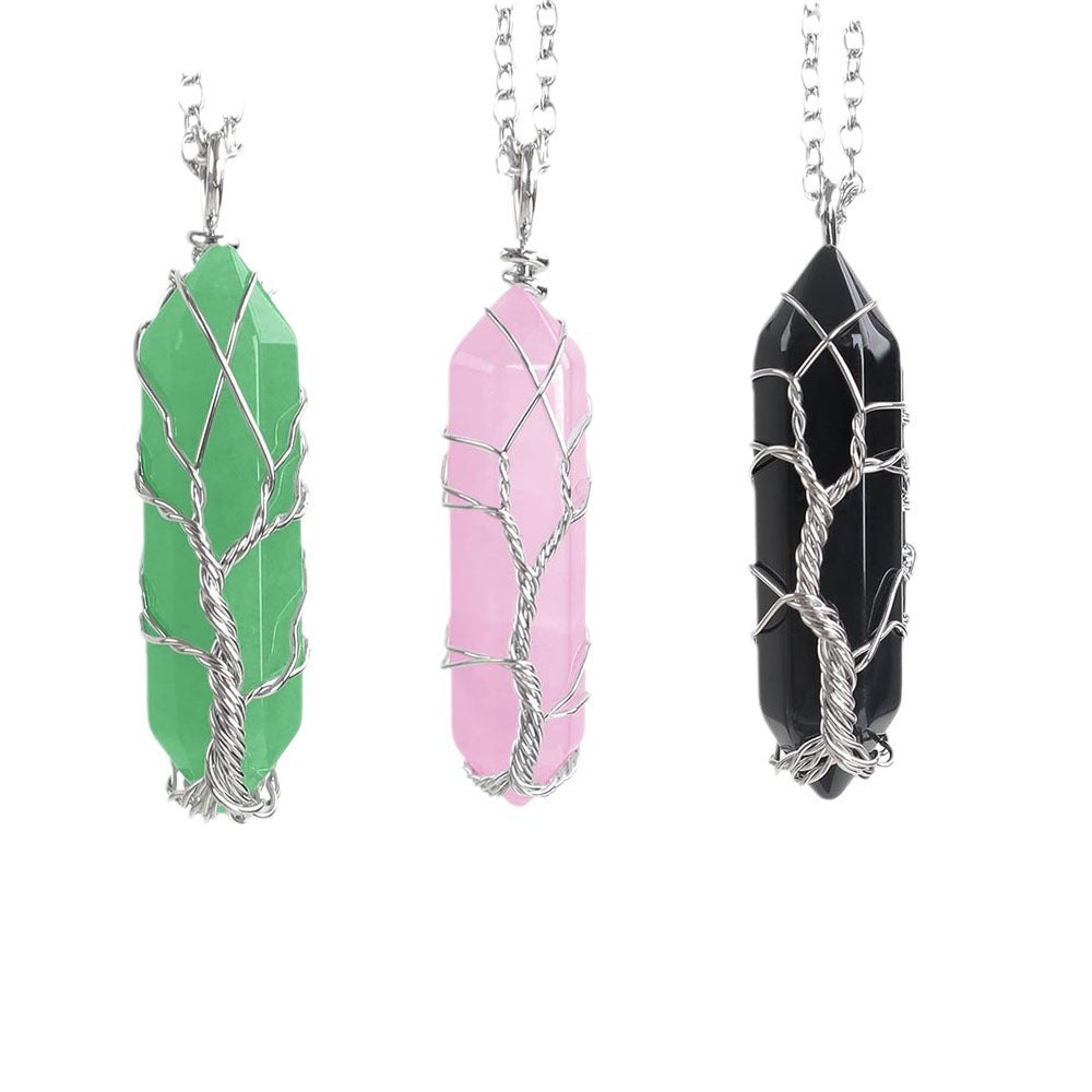 Three crystal pendant necklaces in green, pink, and black on a white background
