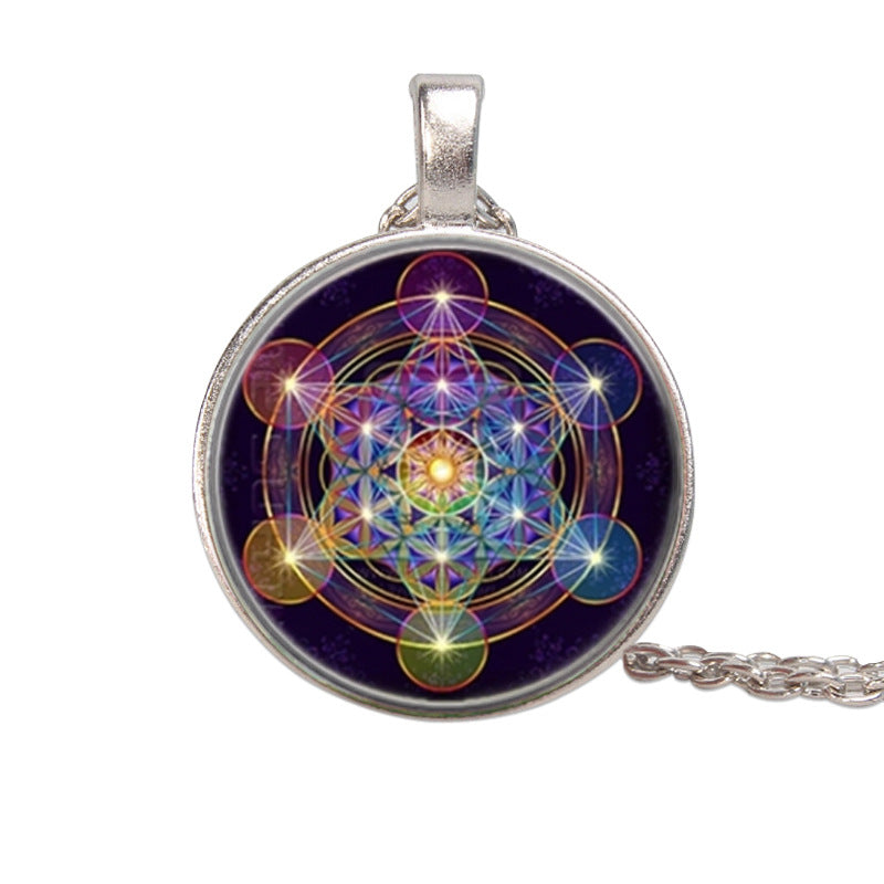 Pendant with colorful geometric design on a white background