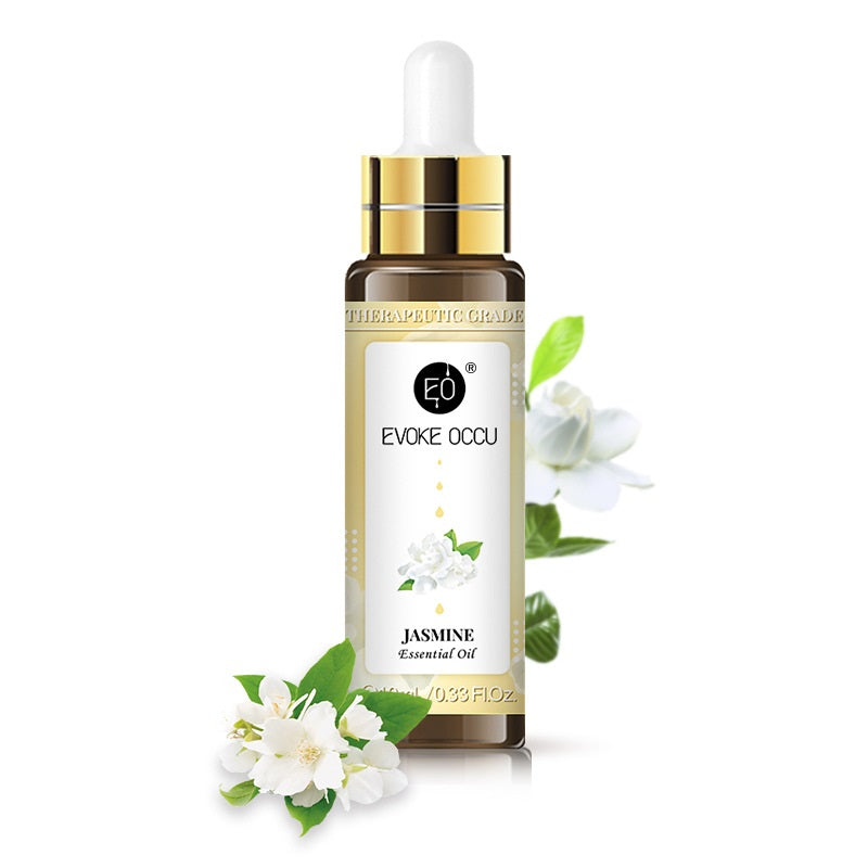 Essential oil dropper bottle with jasmine flowers on a white background