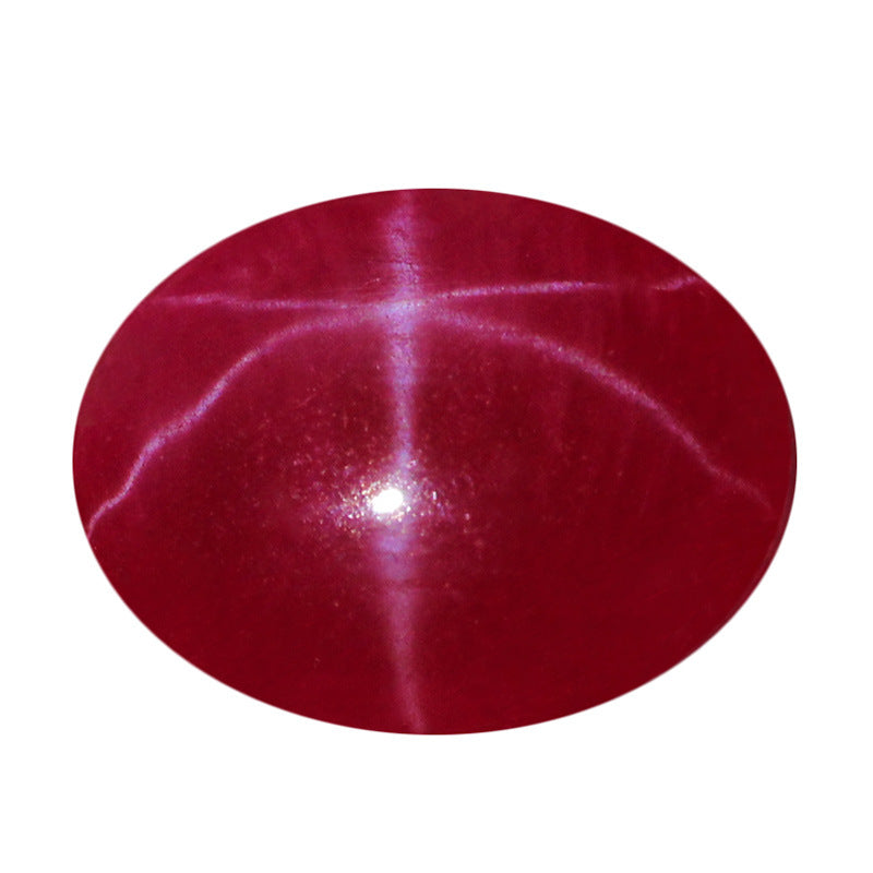 Red star-shaped gemstone on a white background