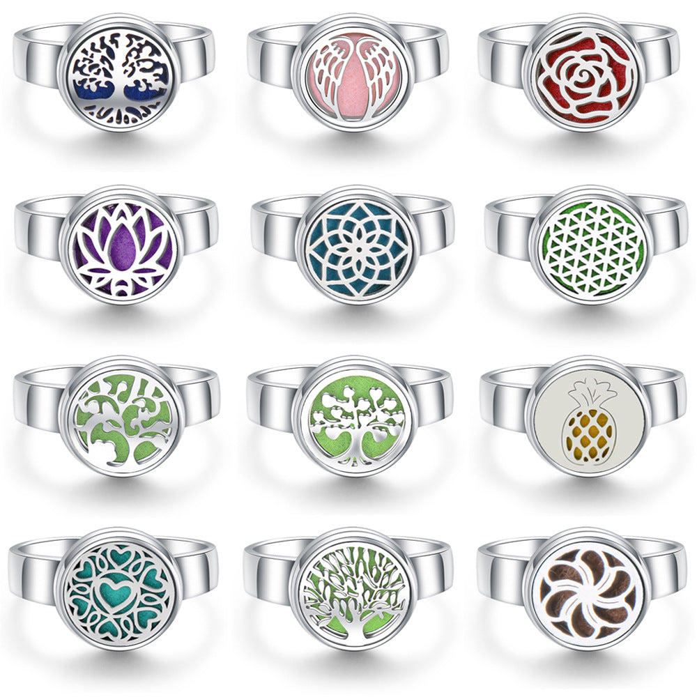 Collection of silver rings with various colorful designs on a white background