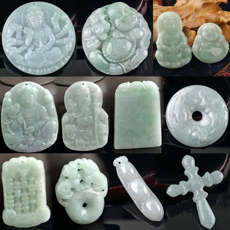 Collection of various jade pendants on a dark background