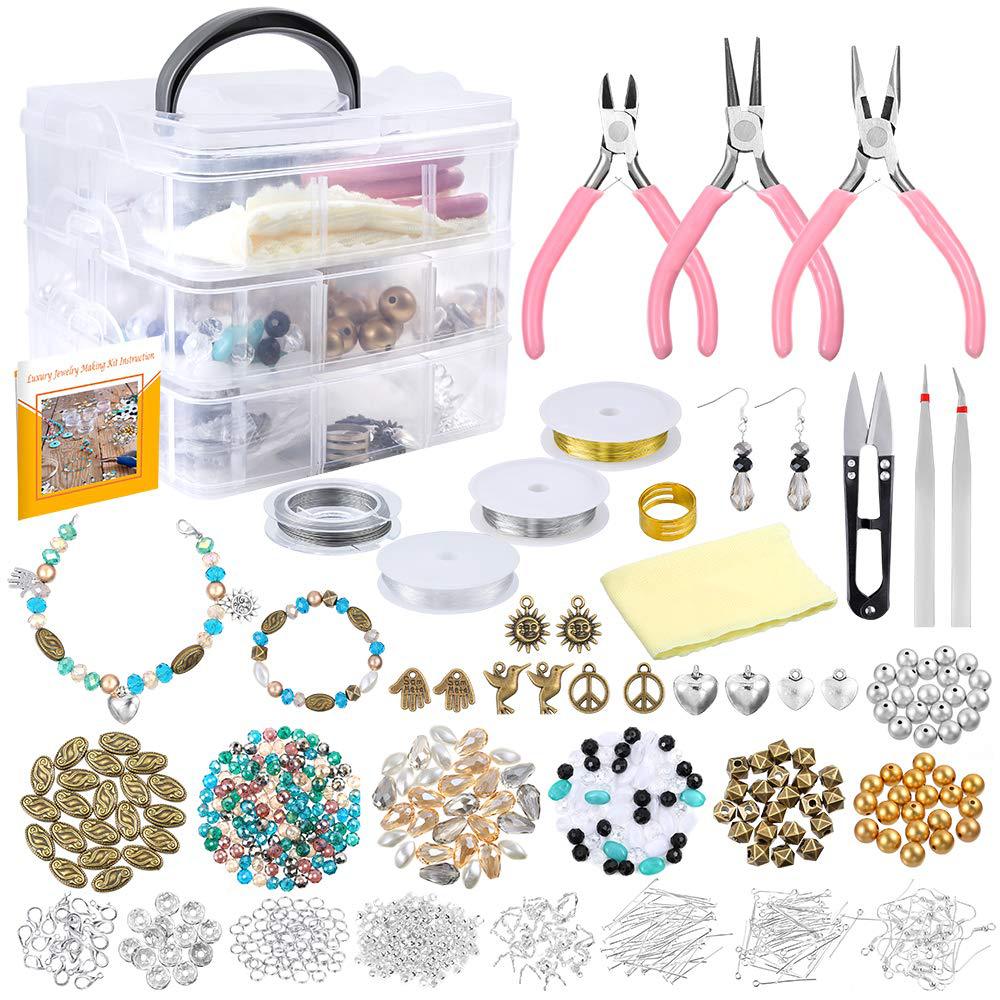 Jewelry making kit with tools, beads, and components on a white background