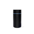 Black cylindrical device with a blue light on a white background