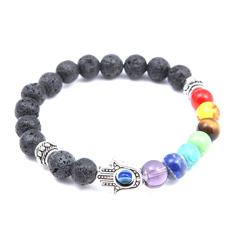 Multicolored beaded bracelet with a Hamsa hand charm on a white background