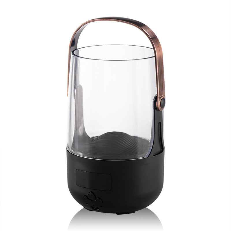 Black and bronze portable lantern with glass container on a white background