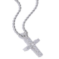 Silver cross pendant necklace on a white background
