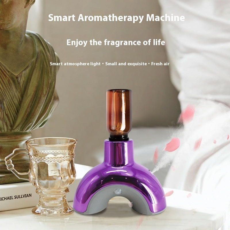 Smart aromatherapy machine on a surface with decorative items