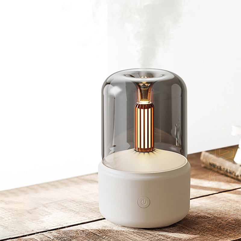 Modern humidifier with glass and ceramic design on a wooden surface