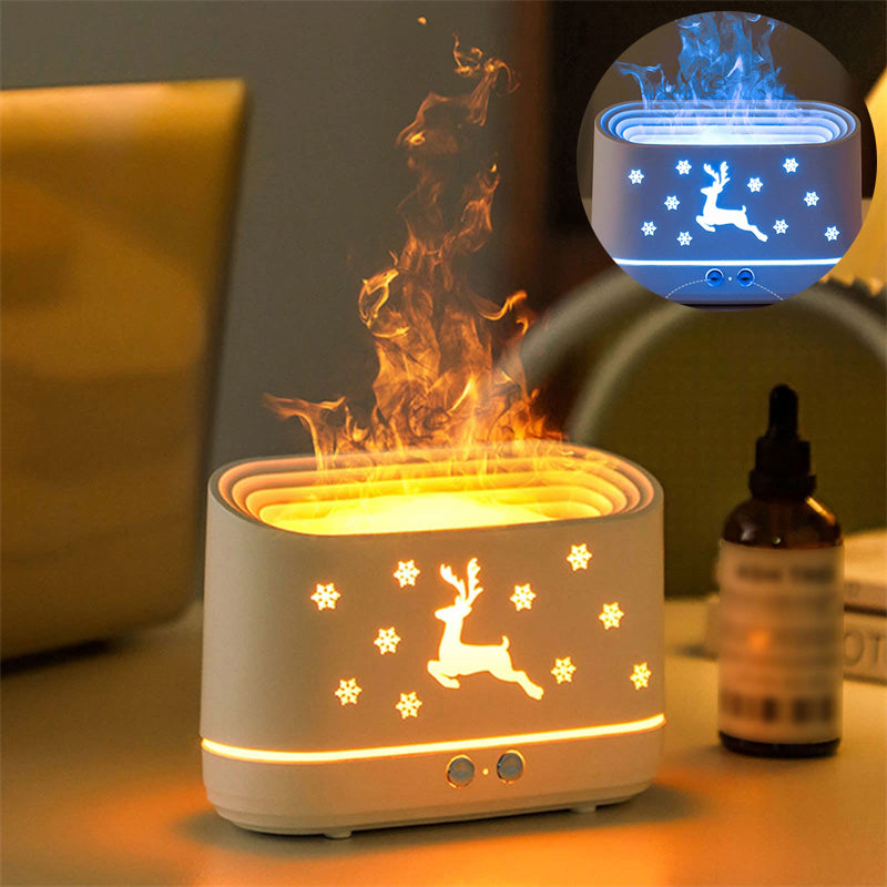 Decorative lamp with reindeer design and flame effect on a table.