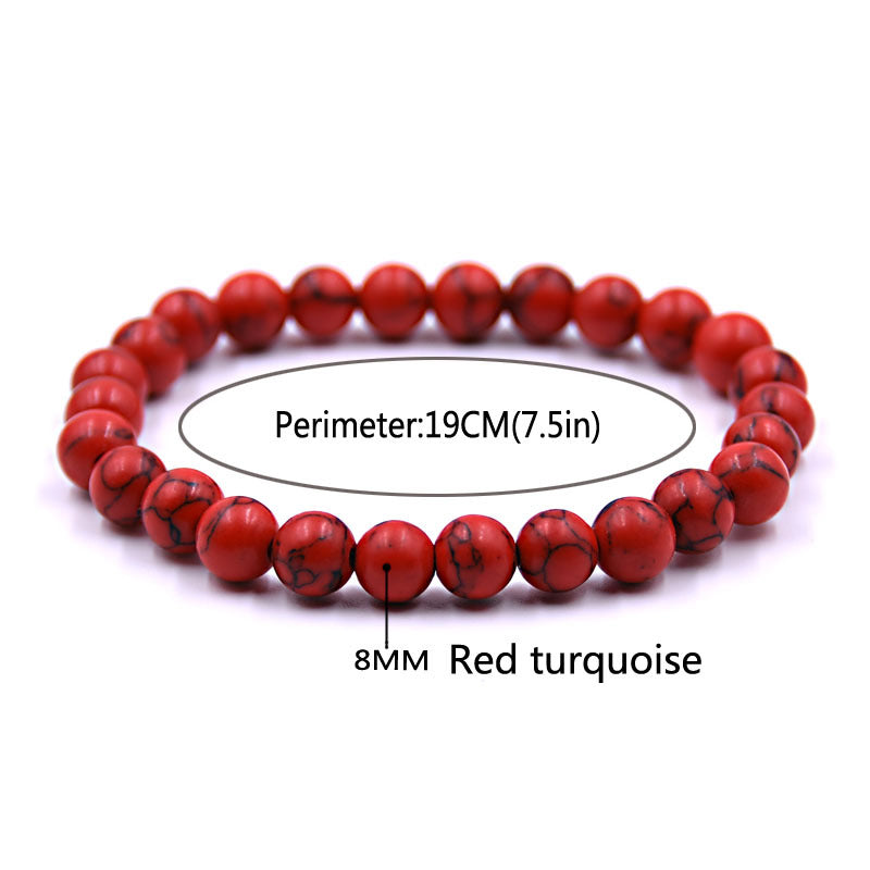 Red turquoise beaded bracelet with measurements on a white background