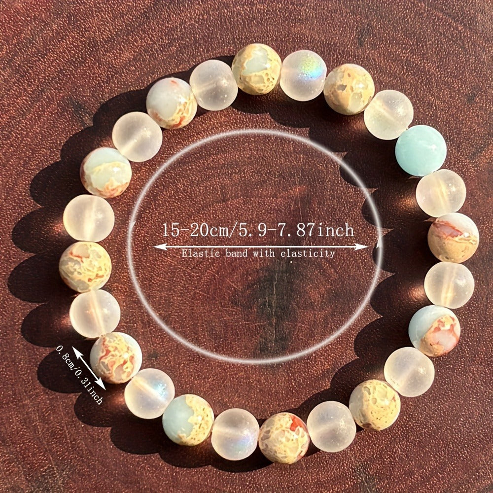 Multicolored beaded bracelet on a wooden surface with measurement text overlay