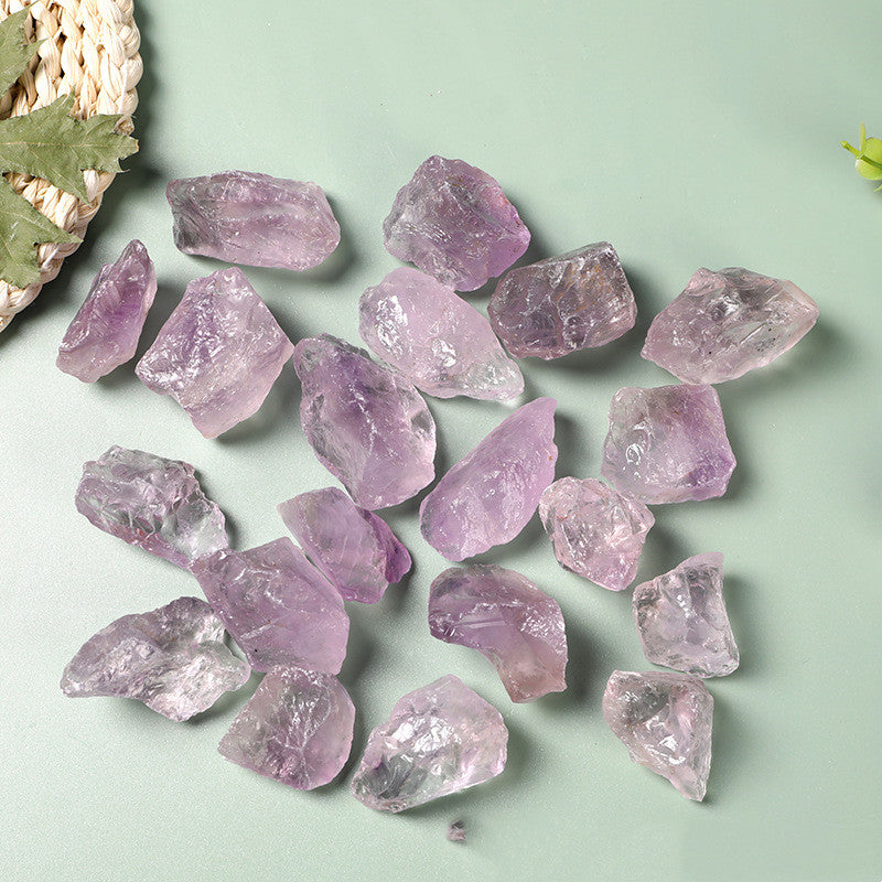 Purple crystals on a light green background