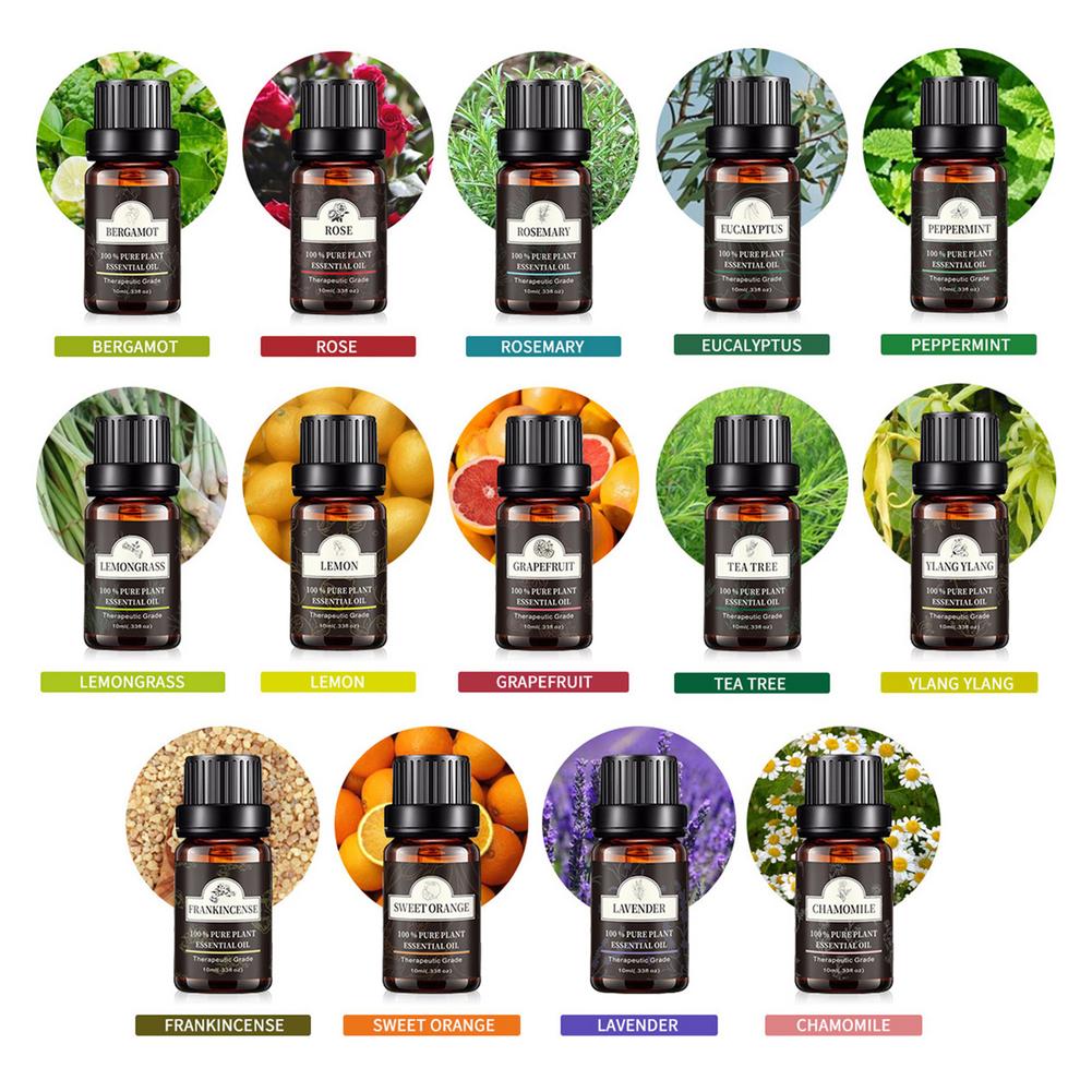 Collection of essential oil bottles with labels on a white background