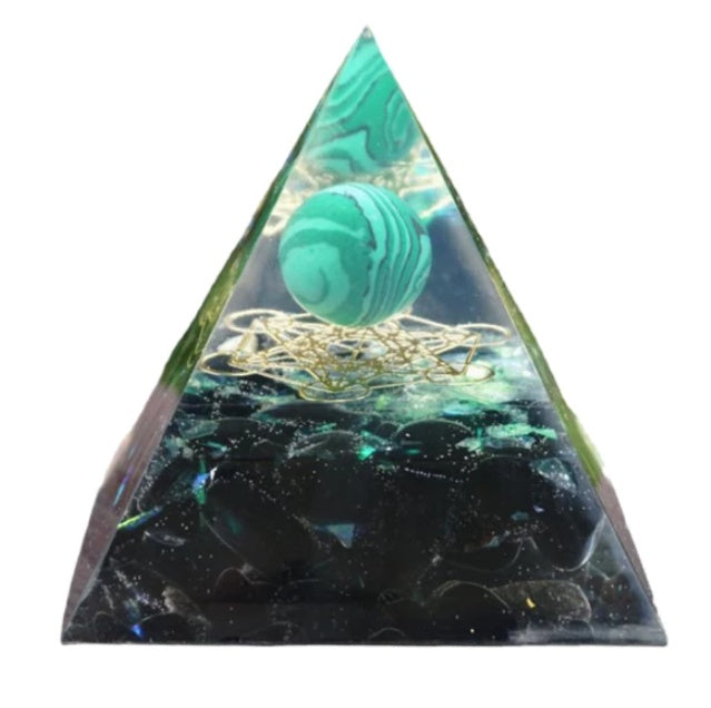 Triangular pyramid with a green marble-like top and black base on a white background